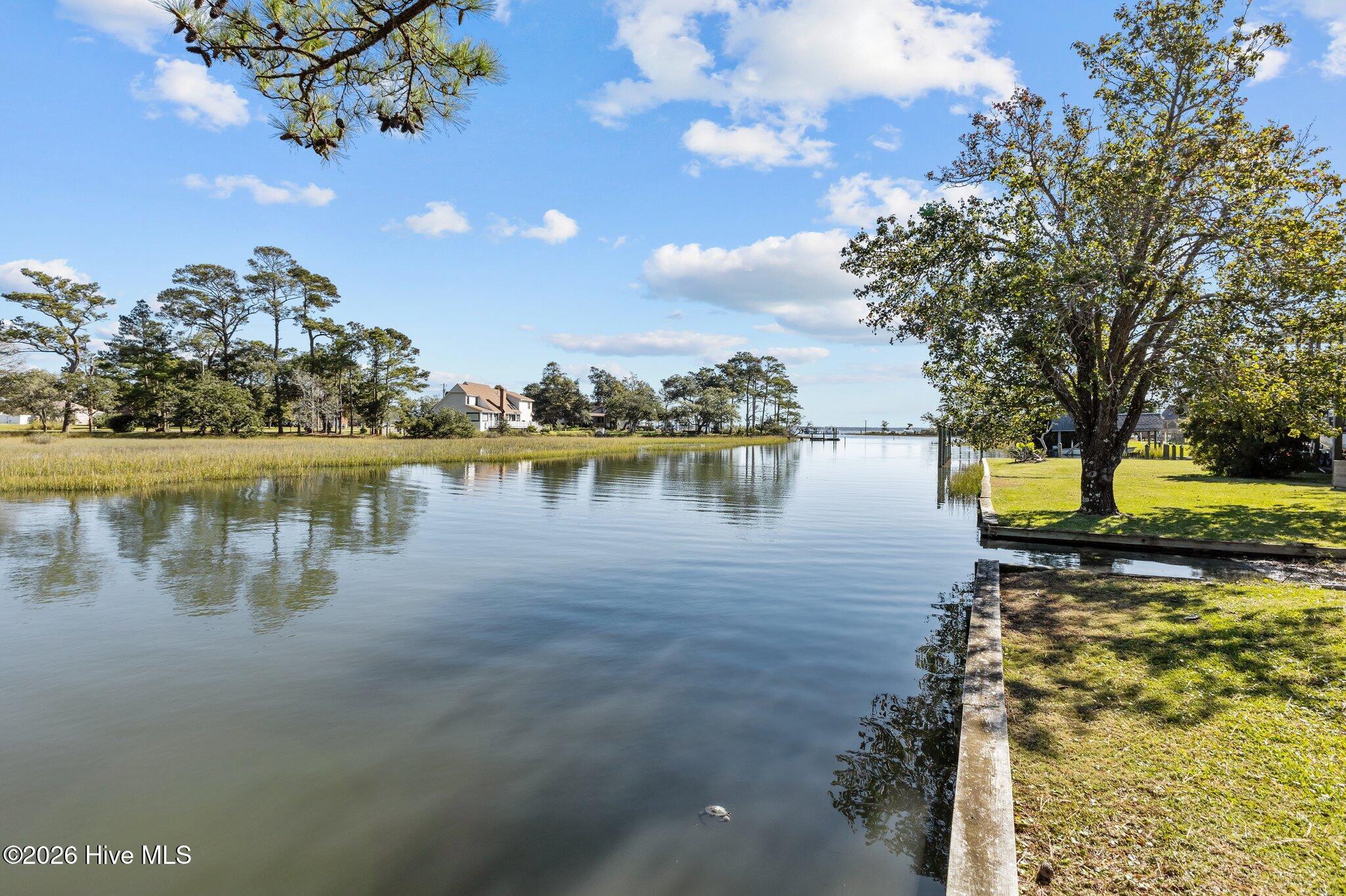 180 Wallace Road Beaufort, NC 28516 - Photo 5 of 45 Water canal empties into the North River