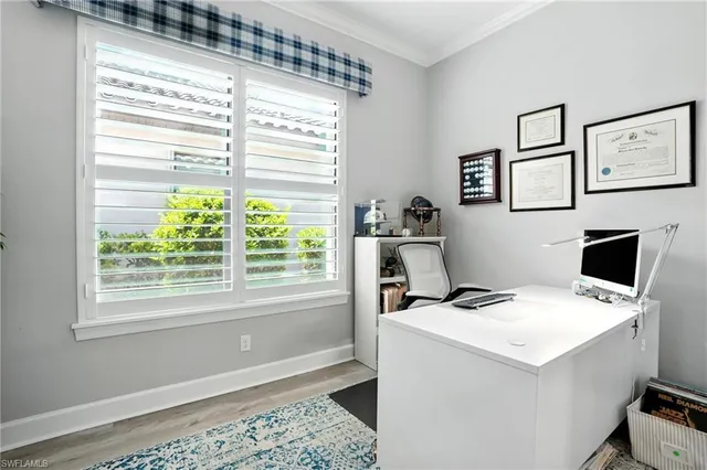 a room with a window and a washer