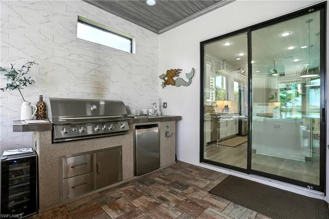 a kitchen with a stove and a shower