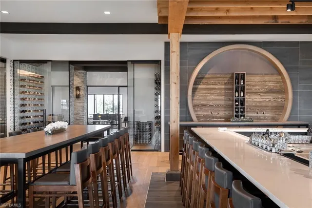 a dining room with a table and chairs