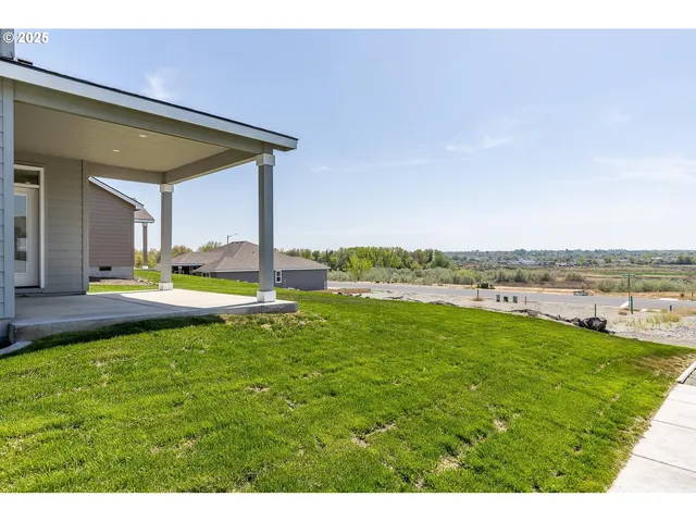 a view of a swimming pool with an ocean view