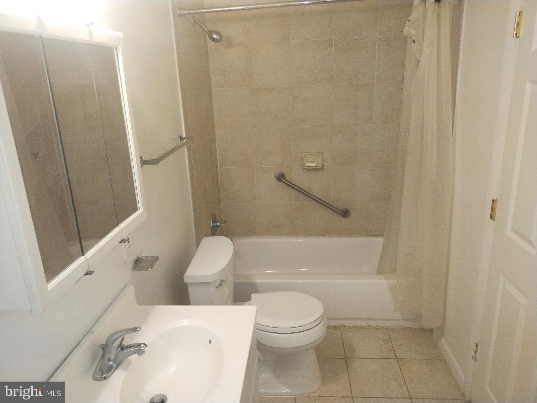 2608 Sansbury Road Upper Marlboro, MD 20774 - Photo 11 of 41 a bathroom with a toilet and a shower