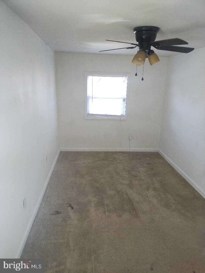 2608 Sansbury Road Upper Marlboro, MD 20774 - Photo 13 of 41 an empty room with a window