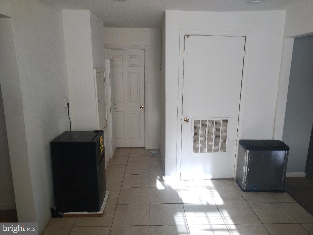 2608 Sansbury Road Upper Marlboro, MD 20774 - Photo 23 of 41 a view of a closet area with a chair