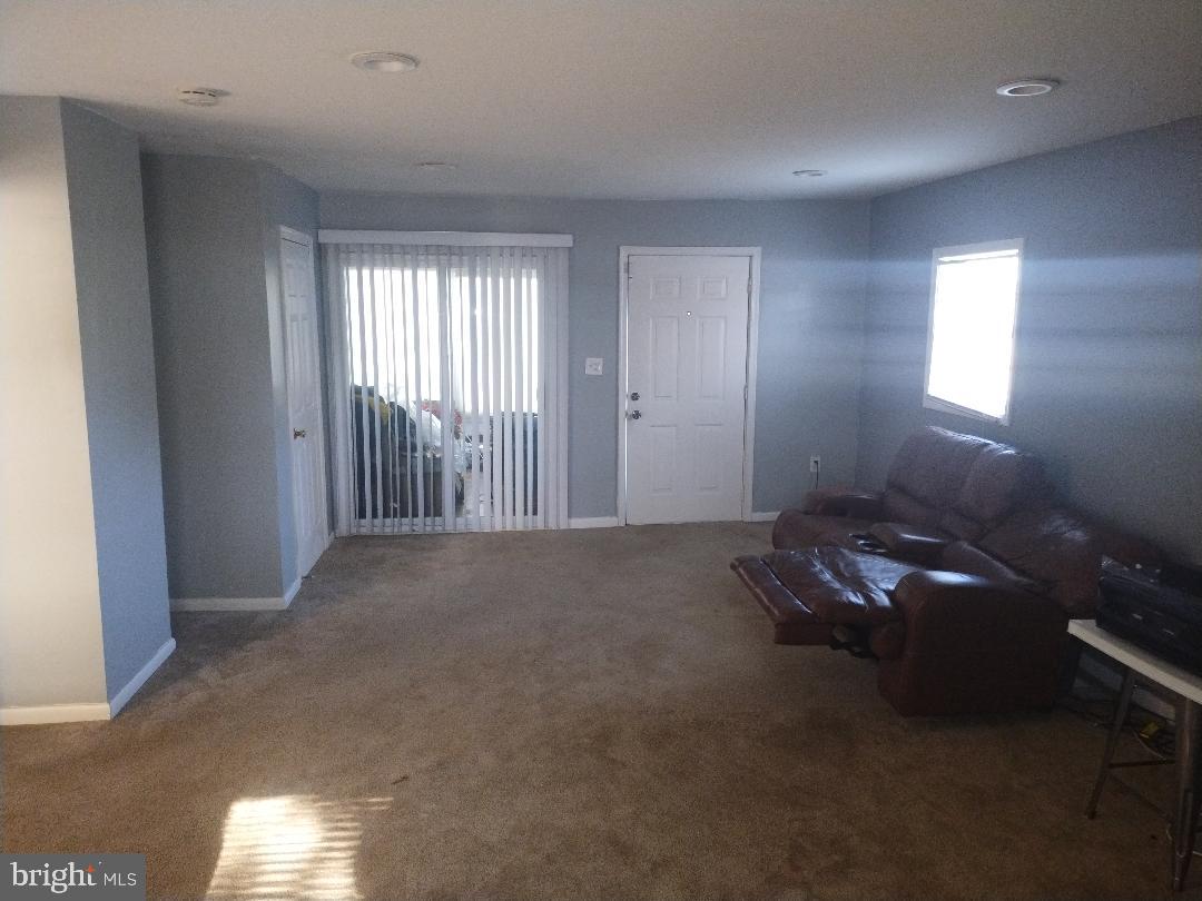 2608 Sansbury Road Upper Marlboro, MD 20774 - Photo 25 of 41 a room with furniture and a window