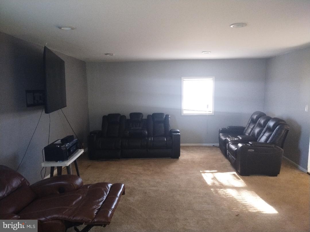 2608 Sansbury Road Upper Marlboro, MD 20774 - Photo 26 of 41 a living room with furniture