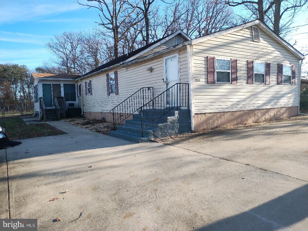 2608 Sansbury Road Upper Marlboro, MD 20774 - Photo 3 of 41 a view of a house with a yard