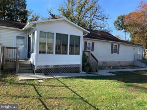 2608 Sansbury Road Upper Marlboro, MD 20774 - Photo 5 of 41 a view of a house with backyard and garden