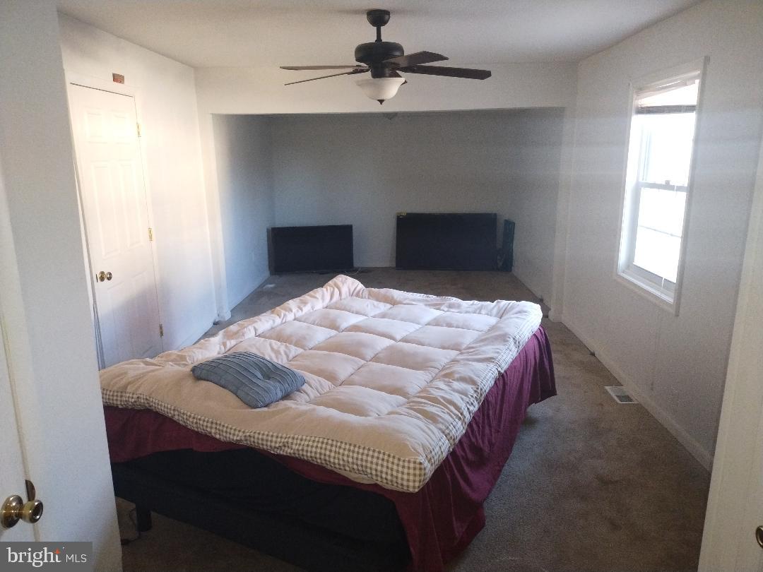 2608 Sansbury Road Upper Marlboro, MD 20774 - Photo 10 of 41 a bedroom with a bed and window