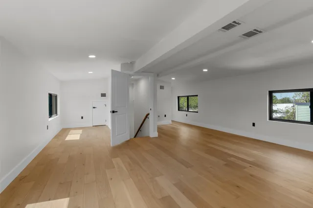 a view of a livingroom with a staircase