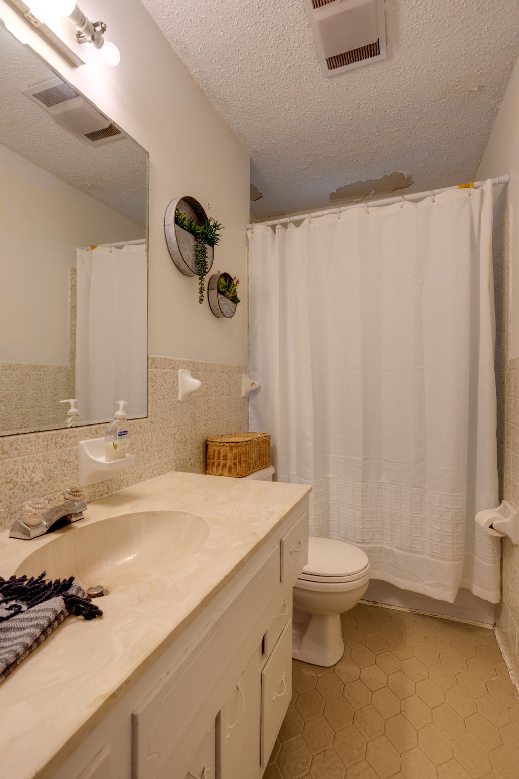 1151 Fowler Ford Road Portland, TN 37148 - Photo 20 of 35 a bathroom with a sink a toilet and a mirror
