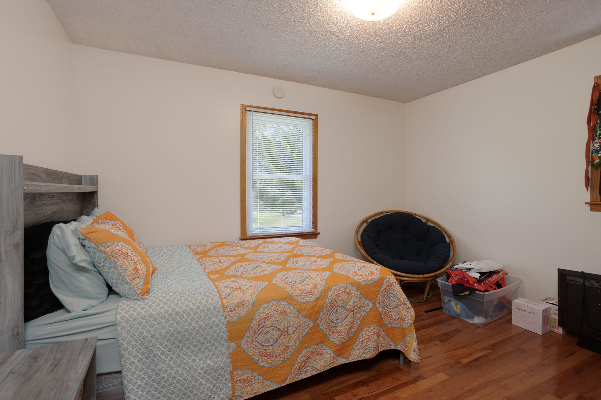1151 Fowler Ford Road Portland, TN 37148 - Photo 21 of 35 a bedroom with a bed and a closet with wooden floor