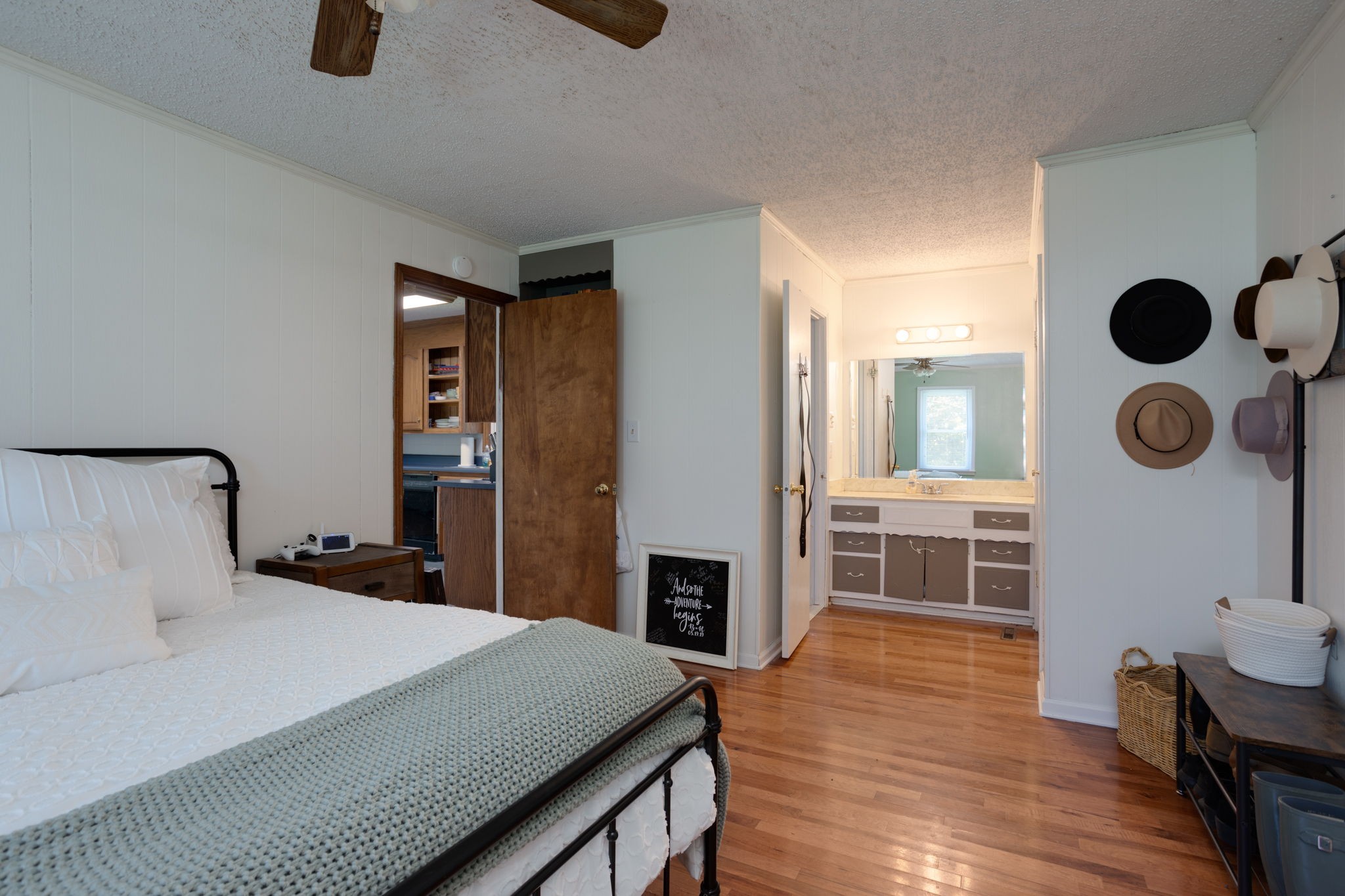 1151 Fowler Ford Road Portland, TN 37148 - Photo 24 of 35 a bedroom with a bed and wooden floor