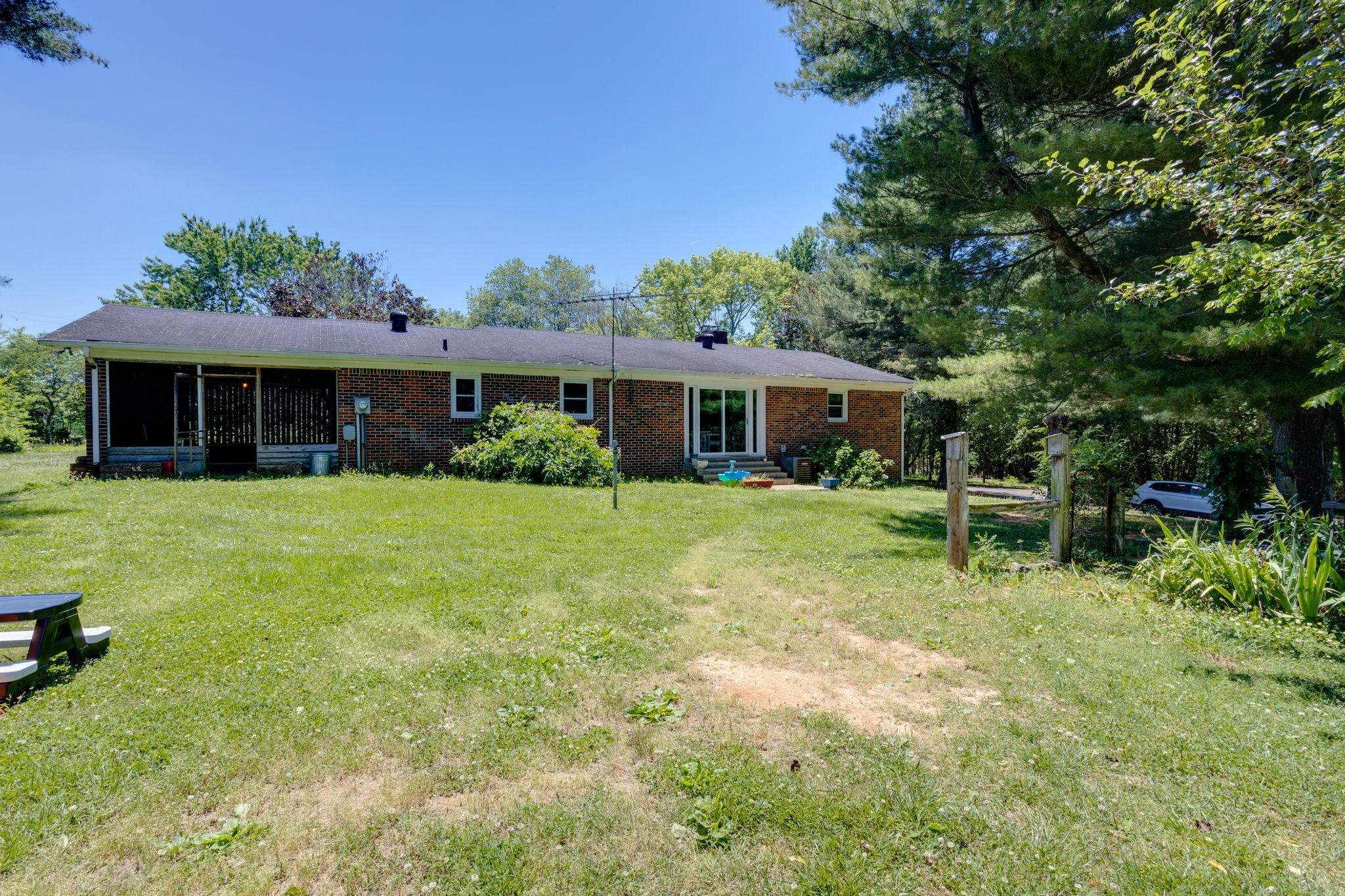 1151 Fowler Ford Road Portland, TN 37148 - Photo 31 of 35 a view of house with backyard porch and sitting area