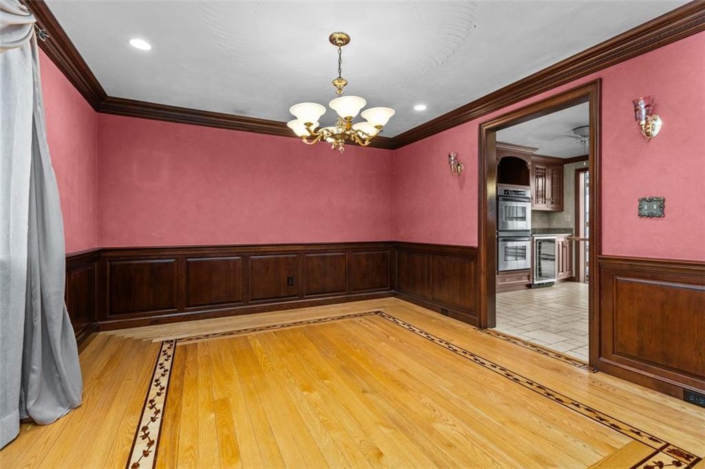 462 Adele Drive Irwin, PA 15642 - Photo 11 of 50 a view of a hallway with a chandelier
