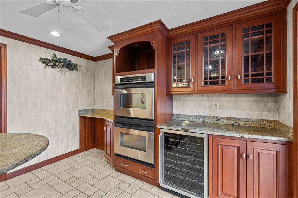 462 Adele Drive Irwin, PA 15642 - Photo 14 of 50 a kitchen with granite countertop a sink and a stove