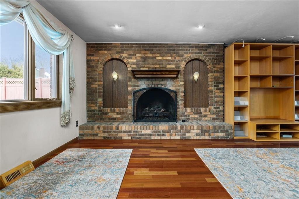 462 Adele Drive Irwin, PA 15642 - Photo 19 of 50 a bathroom with a granite countertop sink and a mirror