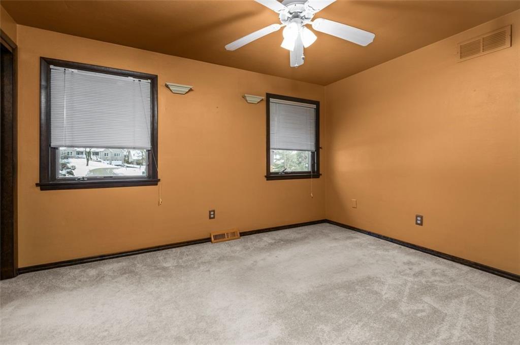 462 Adele Drive Irwin, PA 15642 - Photo 24 of 50 an empty room with a window and a fan