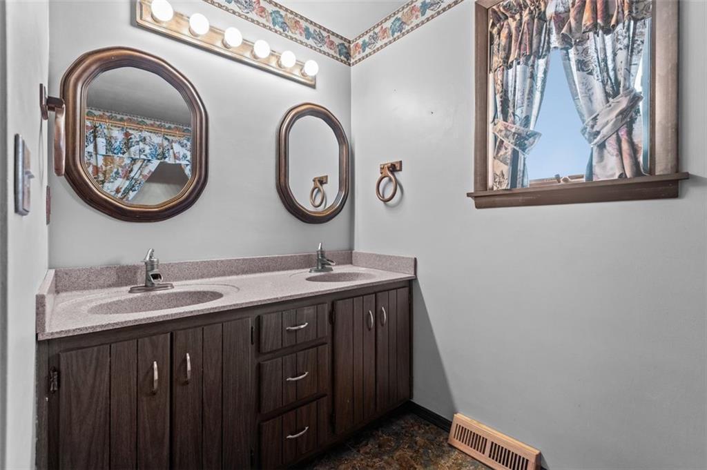 462 Adele Drive Irwin, PA 15642 - Photo 28 of 50 a bathroom with a sink and a mirror