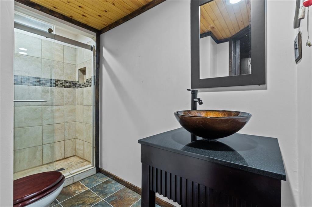 462 Adele Drive Irwin, PA 15642 - Photo 32 of 50 a bathroom with a sink and a mirror