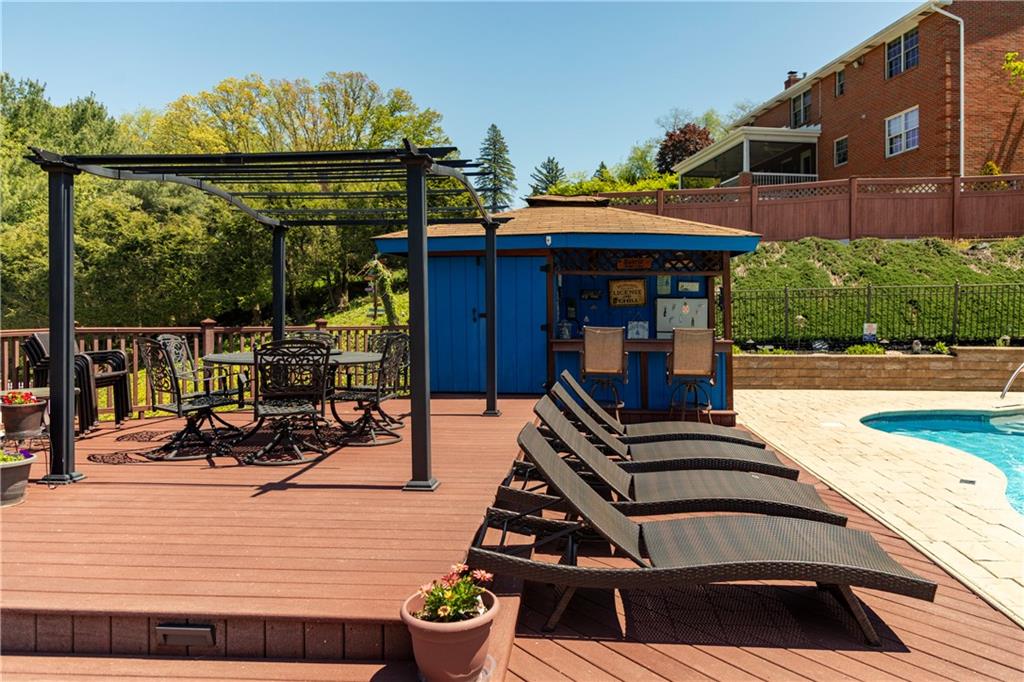 462 Adele Drive Irwin, PA 15642 - Photo 40 of 50 a view of a patio with table and chairs barbeque potted plants and large tree