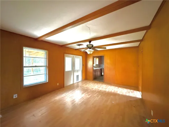 an empty room with windows