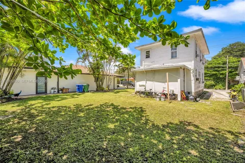 a view of a house with swimming pool