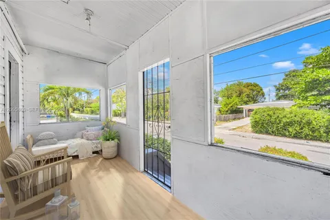 a view of a living room and a window
