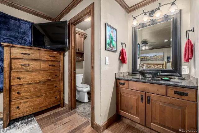 a view of a bathroom with a sink and a mirror