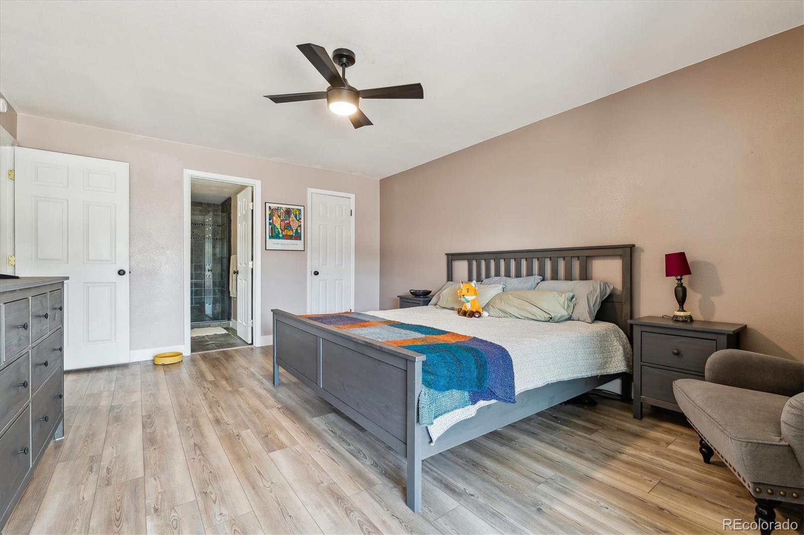 6495 East Happy Canyon Road, Unit 163 Denver, CO 80237 - Photo 16 of 27 a bedroom with bed and window