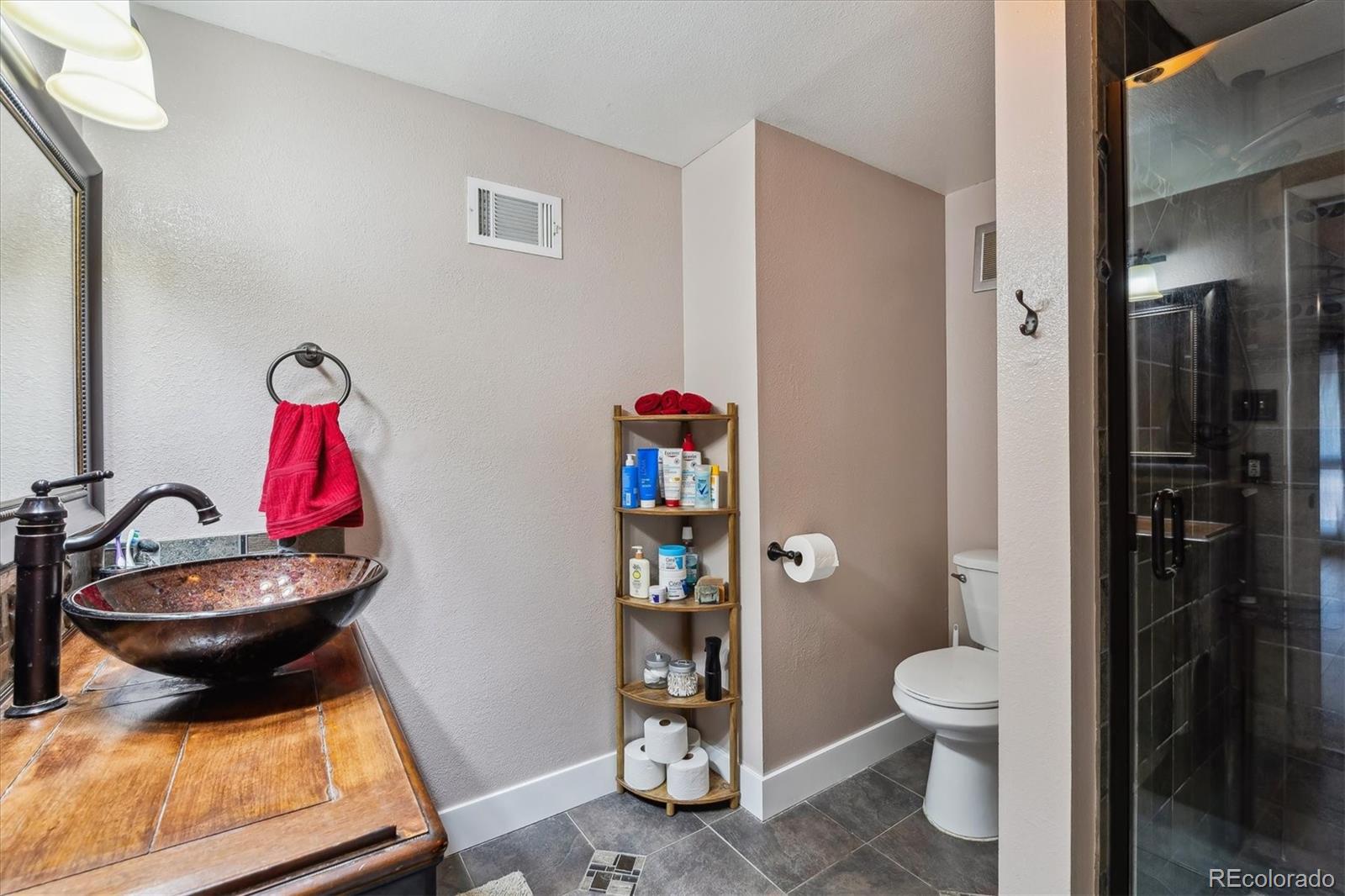 6495 East Happy Canyon Road, Unit 163 Denver, CO 80237 - Photo 18 of 27 a room with furniture and wooden floor