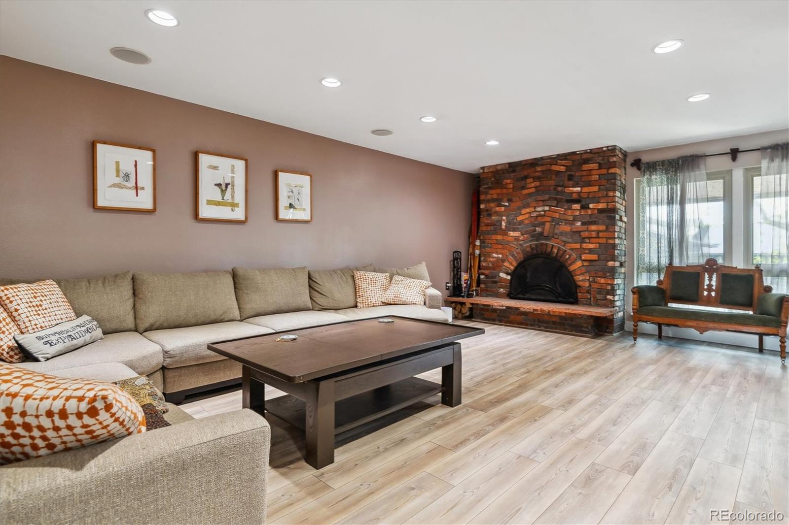 6495 East Happy Canyon Road, Unit 163 Denver, CO 80237 - Photo 6 of 27 a living room with furniture and a wooden floor