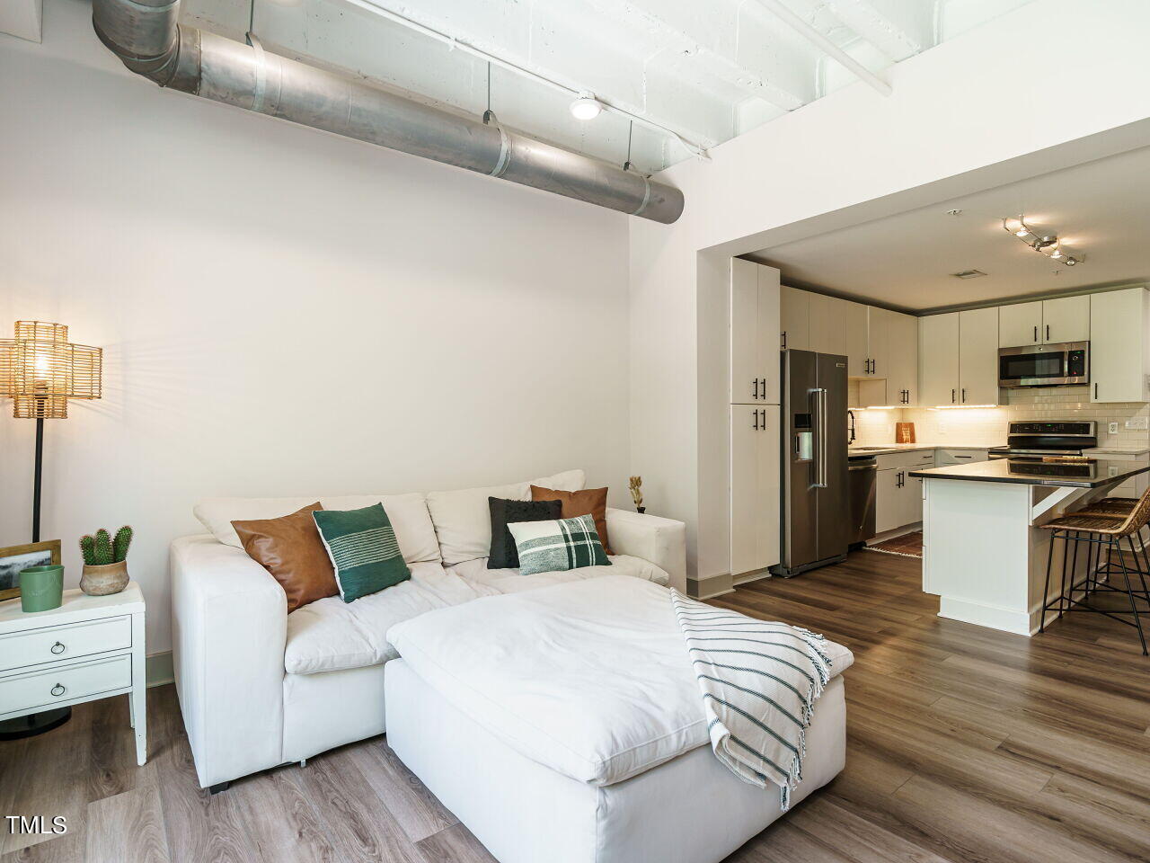 1300 St Marys Street, Unit 407 Raleigh, NC 27605 - Photo 12 of 26 012-1280x960-living-room