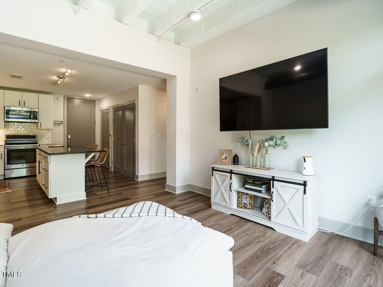 1300 St Marys Street, Unit 407 Raleigh, NC 27605 - Photo 13 of 26 013-1280x960-living-room