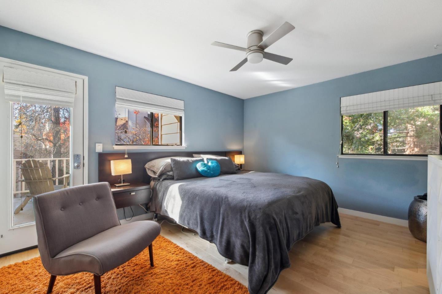 181 Ada Avenue, Unit 47 Mountain View, CA 94043 - Photo 12 of 32 a bedroom with a bed a couch and a window