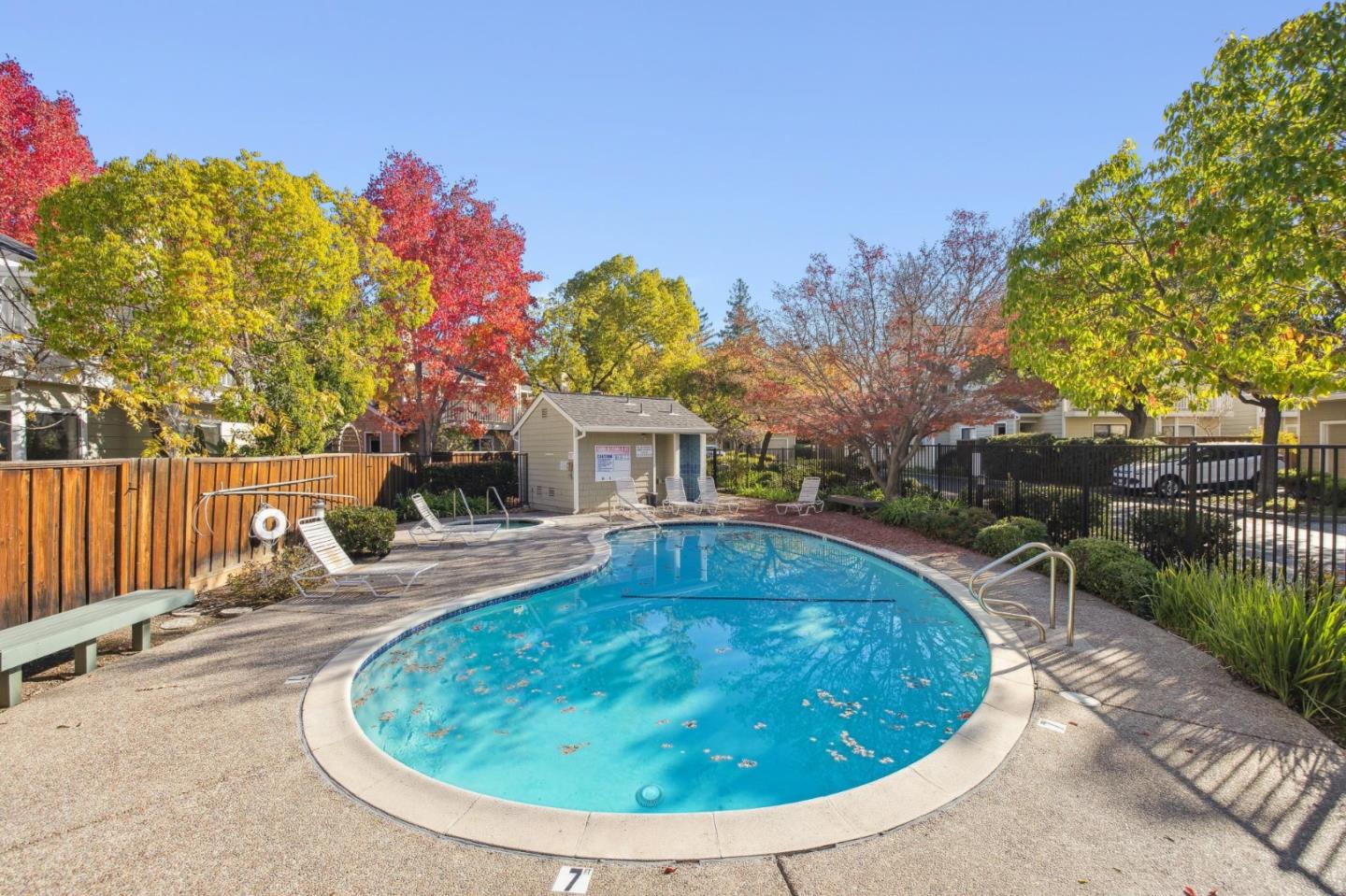181 Ada Avenue, Unit 47 Mountain View, CA 94043 - Photo 30 of 32 a swimming pool with outdoor seating and yard