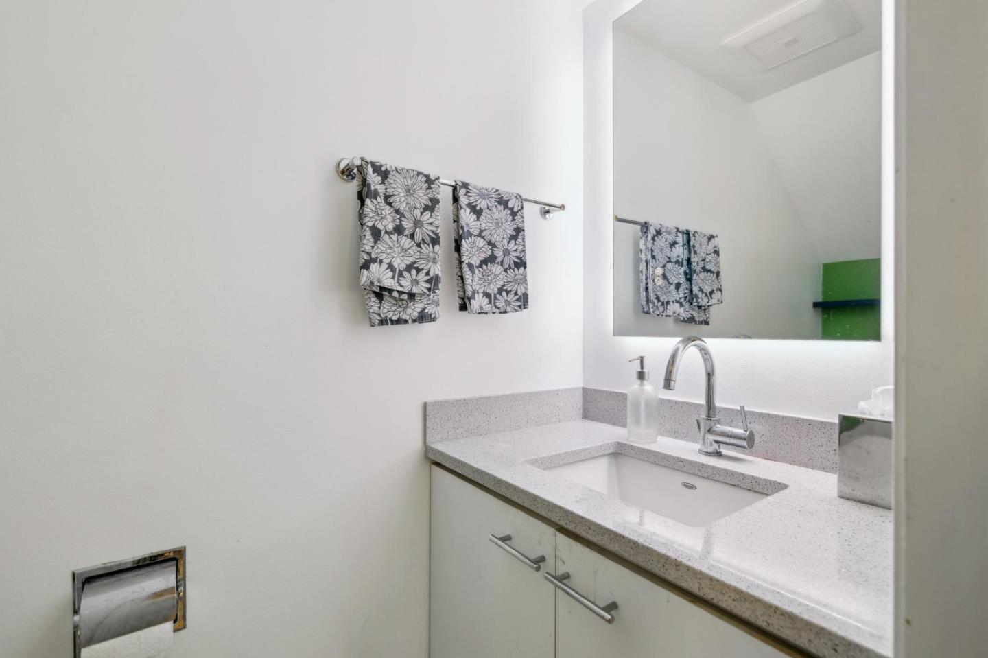 181 Ada Avenue, Unit 47 Mountain View, CA 94043 - Photo 6 of 32 a bathroom with a sink and a mirror