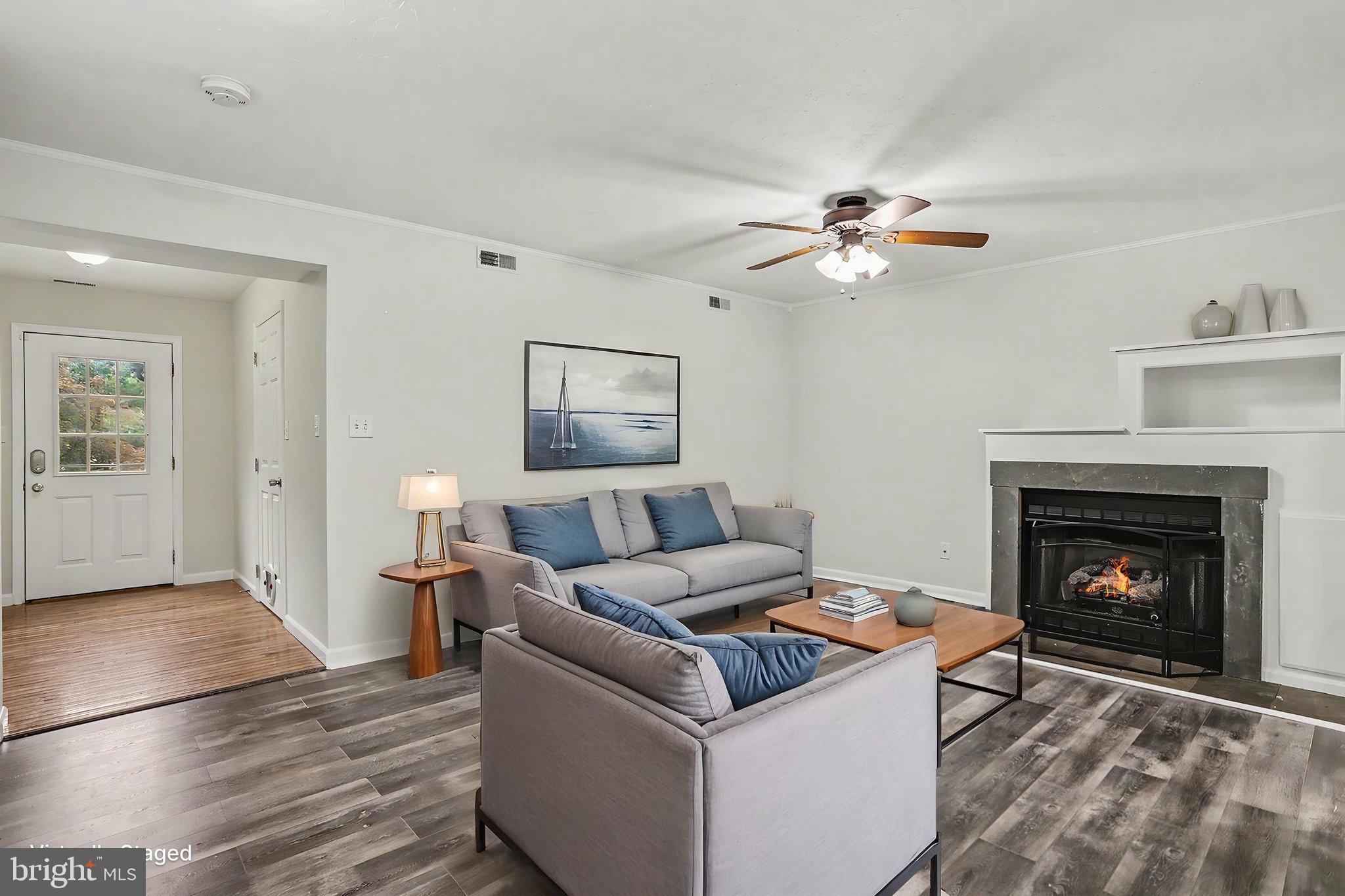436 Springbrook Court, Unit E1 Hanover, PA 17331 - Photo 4 of 36 Living Room with Gas Fireplace (virtually staged)