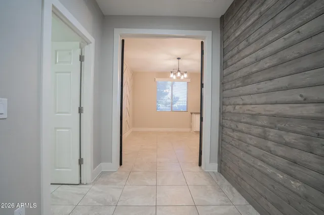 a kitchen with cabinets and window