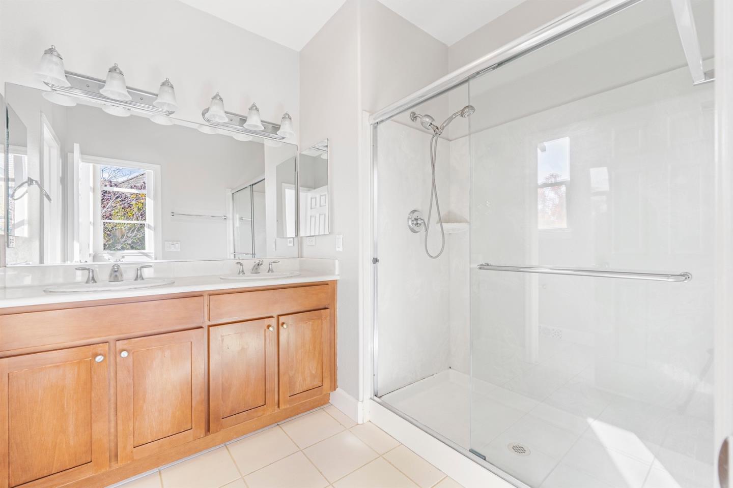 2102 Klassen Way San Jose, CA 95131 - Photo 15 of 31 a bathroom with a tub shower and sink
