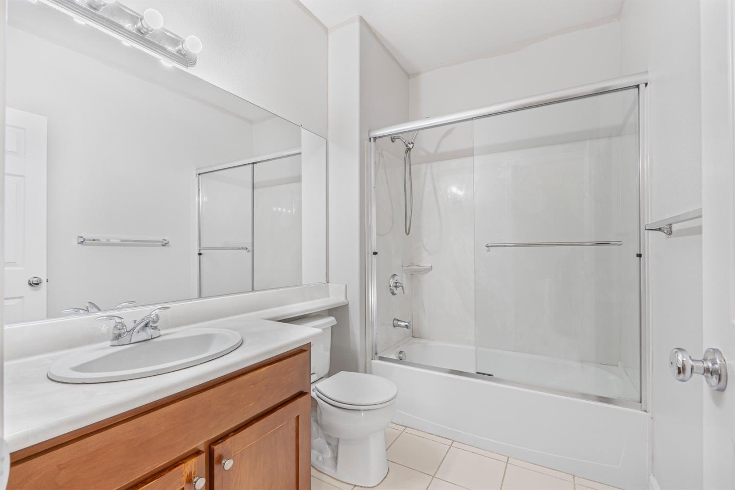 2102 Klassen Way San Jose, CA 95131 - Photo 17 of 31 a bathroom with a sink toilet a mirror and shower