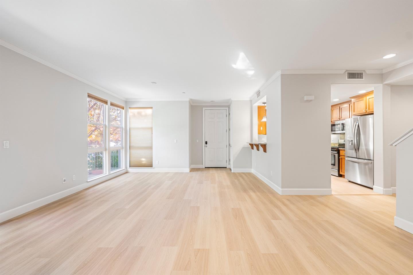2102 Klassen Way San Jose, CA 95131 - Photo 4 of 31 a view of an empty room with wooden floor and a window