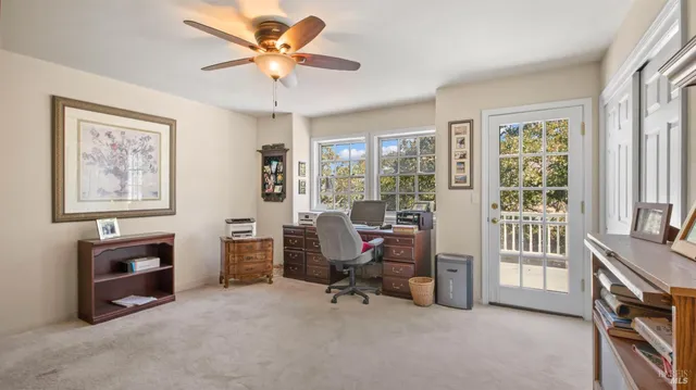 a bedroom with a bed and a fireplace