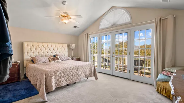 a bath tub sitting next to a window