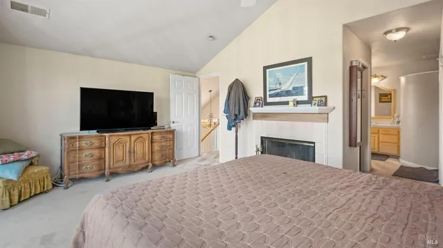 a view of a balcony with wooden fence