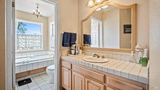 a view of balcony with wooden floor and fence