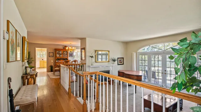a view of a living room and dining room
