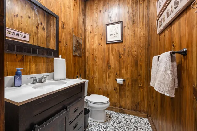 a view of an chairs and tables in the balcony