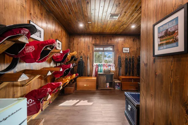 a view of a porch with furniture and a garage