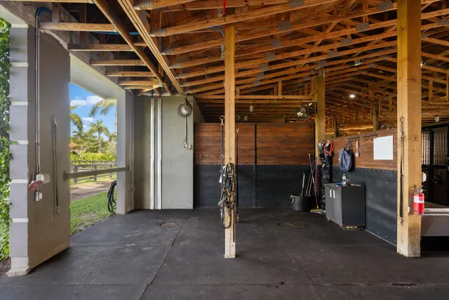 a view of a porch with wooden floor